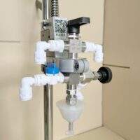 Manual counter pressure bottle filler.